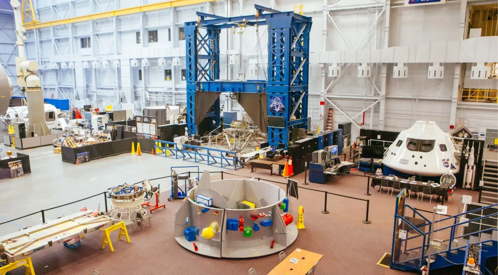 The astronaut training floor at NASA's Johnson Space Center with spacecraft mock-ups