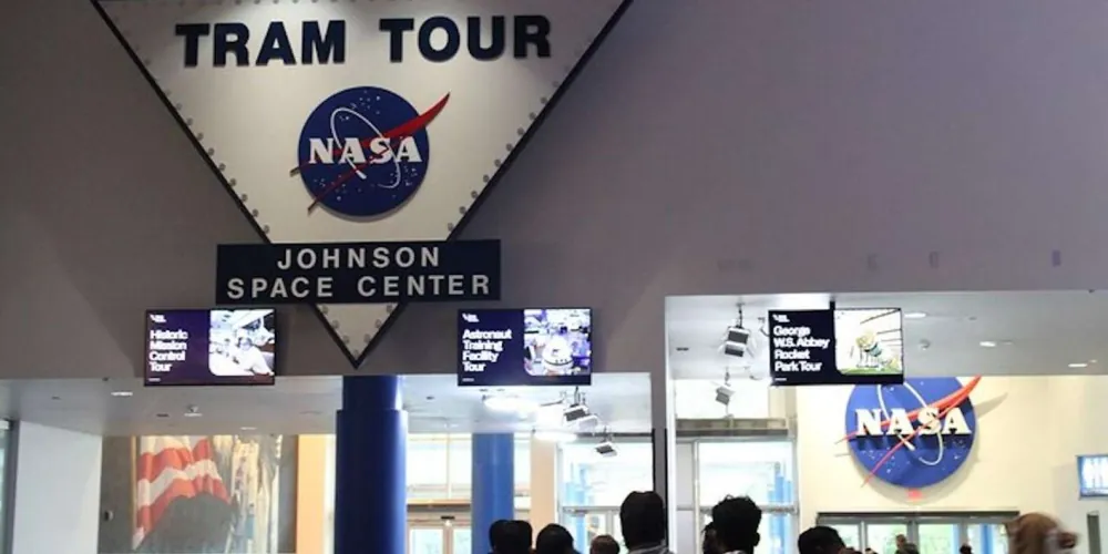 NASA Tram Tour sign for the Historic Mission Control, Astronaut Training, and Rocket Park routes